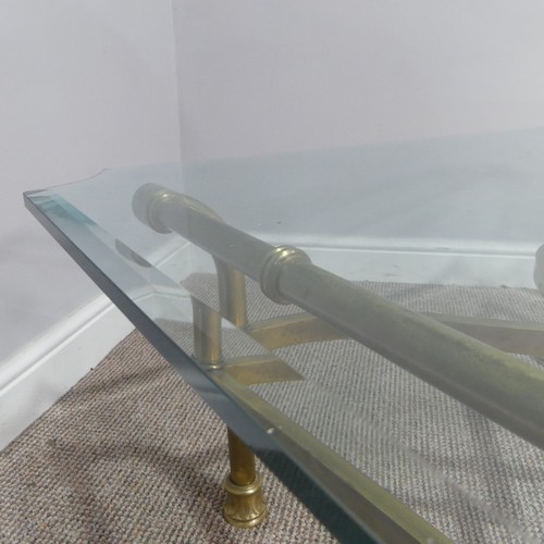 380 - A retro designer Coffee Table, (made in Italy) with shaped bevelled glass top supported by four curv... 