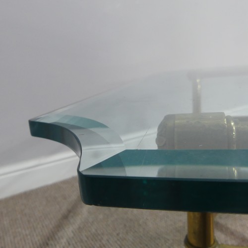 380 - A retro designer Coffee Table, (made in Italy) with shaped bevelled glass top supported by four curv... 