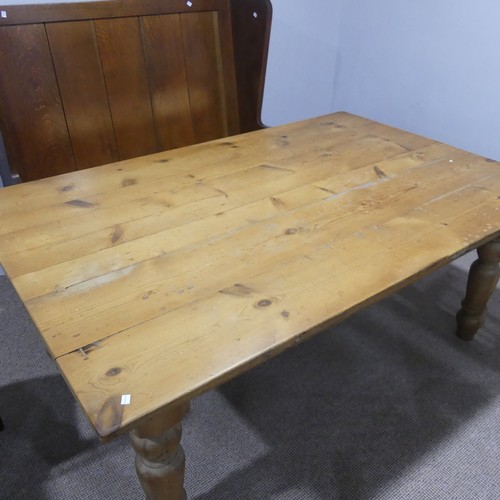 387 - A wide vintage pine farmhouse Kitchen Table, raised on baluster turned legs, W 183 cm x H 75.5 cm x ... 