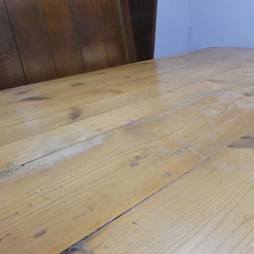 387 - A wide vintage pine farmhouse Kitchen Table, raised on baluster turned legs, W 183 cm x H 75.5 cm x ... 