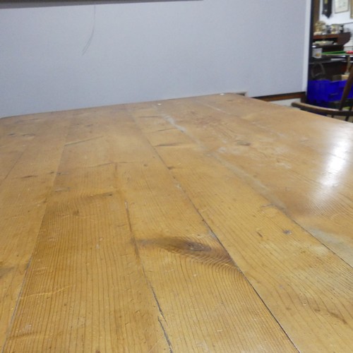 387 - A wide vintage pine farmhouse Kitchen Table, raised on baluster turned legs, W 183 cm x H 75.5 cm x ... 