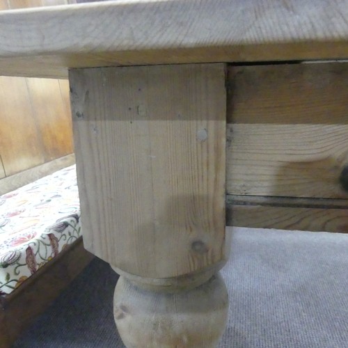 387 - A wide vintage pine farmhouse Kitchen Table, raised on baluster turned legs, W 183 cm x H 75.5 cm x ... 