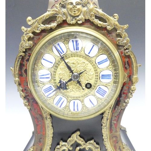 220 - A late 19th century French Boulle work Mantel Clock, the elaborate case with tortoiseshell veneer, b... 