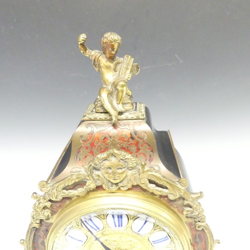 220 - A late 19th century French Boulle work Mantel Clock, the elaborate case with tortoiseshell veneer, b... 