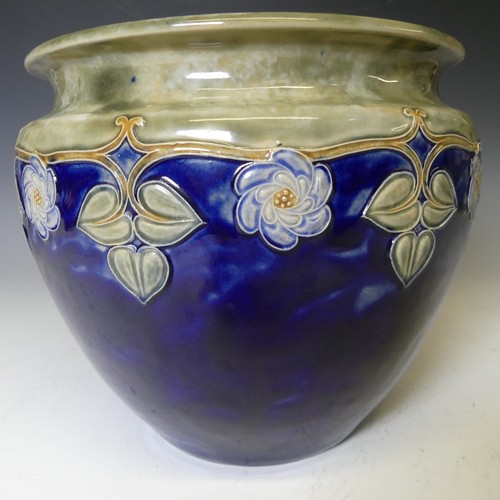 57 - A Royal Doulton stoneware Jardinière, with blue ground and tubelined floral decoration, W 23 cm x H ... 