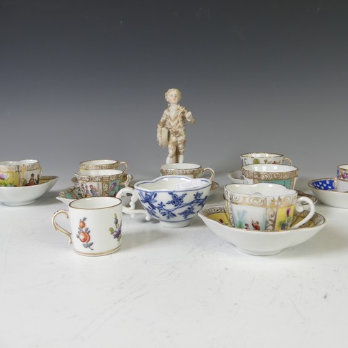 73 - A small quantity of Continental porcelain miniature Teacups and Saucers, each decorated in typical s... 