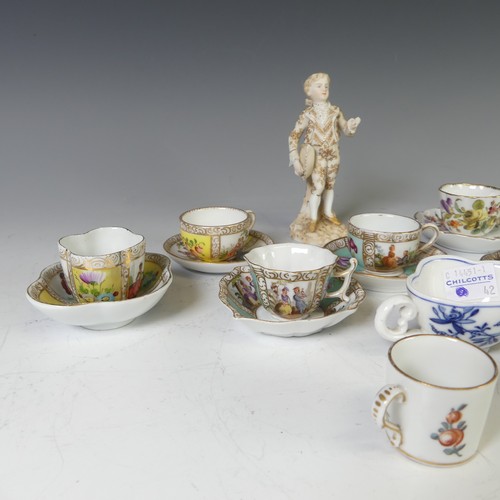 73 - A small quantity of Continental porcelain miniature Teacups and Saucers, each decorated in typical s... 