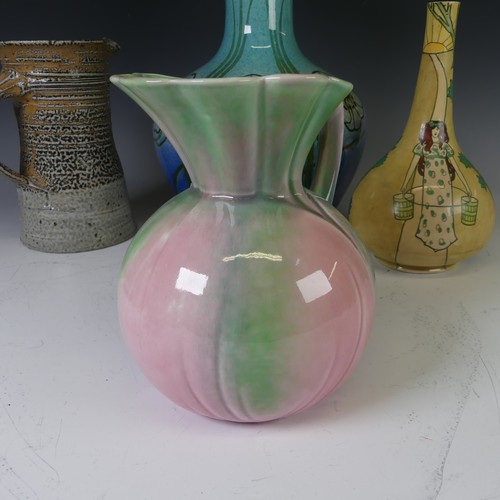 75 - A Spencer Edge pottery art nouveau Bottle Vase, depicting a lady carrying buckets of water, with mar... 