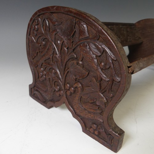 266 - A mahogany Arts and crafts adjustable book rack decorated with brass, 'turquoise' beads and ivorine,... 