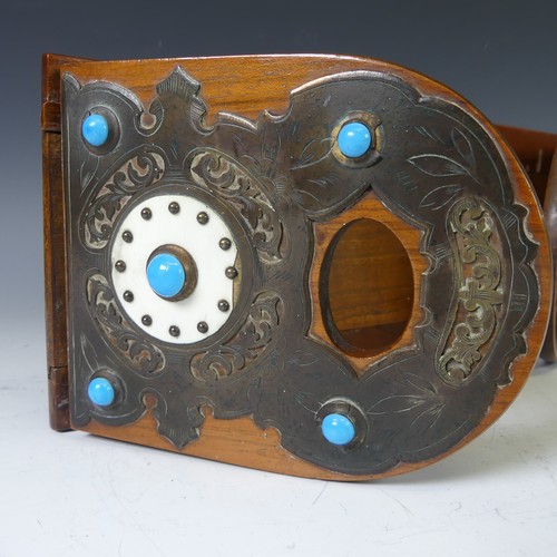 266 - A mahogany Arts and crafts adjustable book rack decorated with brass, 'turquoise' beads and ivorine,... 