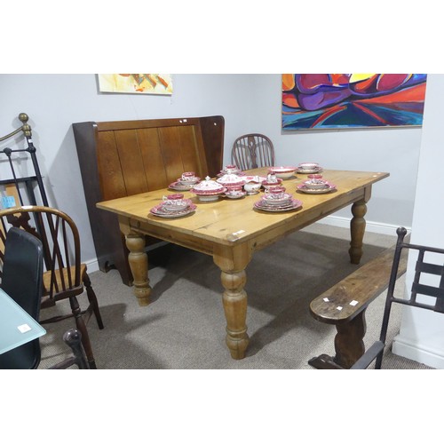 387 - A wide vintage pine farmhouse Kitchen Table, raised on baluster turned legs, W 183 cm x H 75.5 cm x ... 