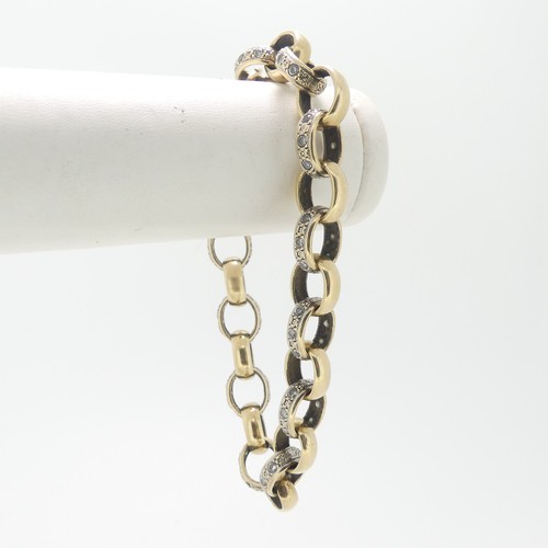 386 - A 9ct gold circular link Bracelet, each alternate link paste set, with watch chain clip clasp, 20cm ... 