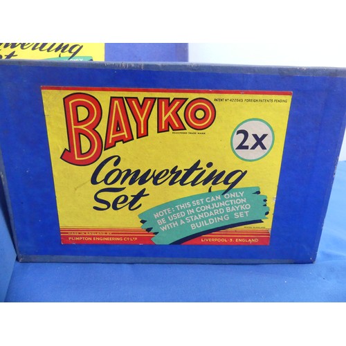 436 - Three BAYKO building sets, consisting of a 2X Building set, a 2X converting set and a 3X converting ... 