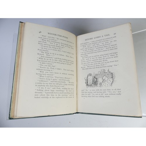 26 - Milne (A.A); 'Winnie the Pooh', first edition, Methuen & Co., 1926, publishers pictoral gilt gre... 