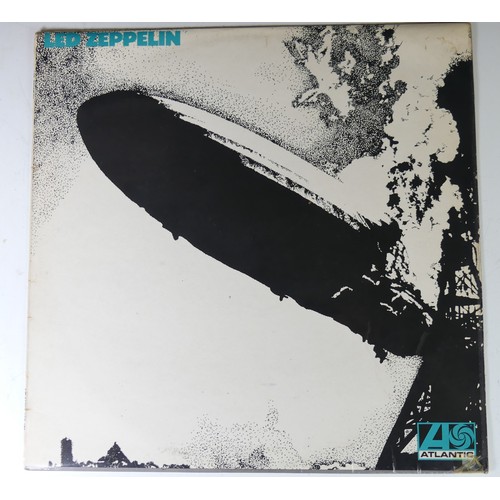 Vinyl Records; Led Zeppelin (I) LP, Original UK First Pressing 1969 on Atlantic (588171), plum labels with Superhype/Jewel credits, laminated sleeve with turquoise lettering and grey stripe, inked name to Side 1 and sleeve reverse, old tape repair to bottom right corner on Atlantic label, 'corrected 8's' on matrix.