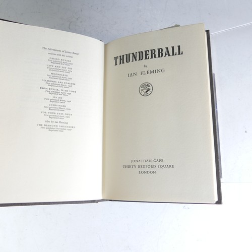 Fleming (Ian); 'Thunderball', First Edition, pub. Jonathan Cape, London 1961, in publishers original black cloth with gilt lettering on spine, blind stamped skeletal hand on upper cover, in the pictorial dustwrapper, with ink signature 'Enid Jones 1961'.