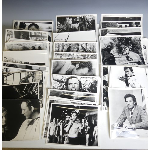 77 - A quantity of black and white Clint Eastwood movie Lobby Cards, including 'The Good The Bad The Ugly... 