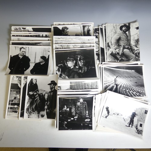 77 - A quantity of black and white Clint Eastwood movie Lobby Cards, including 'The Good The Bad The Ugly... 