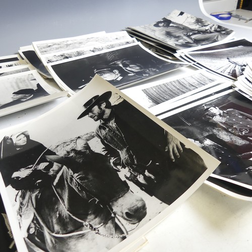 77 - A quantity of black and white Clint Eastwood movie Lobby Cards, including 'The Good The Bad The Ugly... 