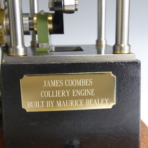 470 - A Stuart Turner James Coombes ‘table’ engine, finely built with 7 inch flywheel and grooved pulley t... 