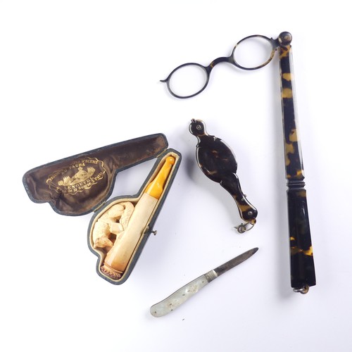 451 - A cased amber mounted Meerschaum Pipe, depicting a fox, together with a pair of tortoiseshell lorgne... 