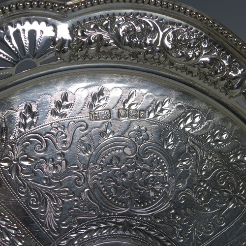 13 - A Victorian silver circular Tray, by Atkin Brothers, hallmarked Sheffield, 1892, with pierced and en... 