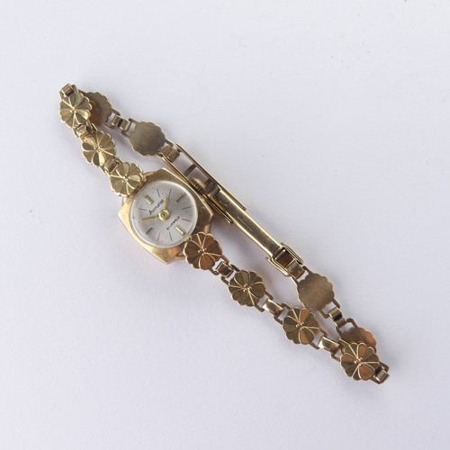 216 - A 9ct gold lady's Accurist Wristwatch, with Swiss 21-jewels movement, on a 9ct yellow gold foliate b... 