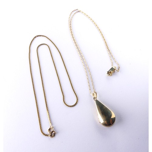 350 - A 9ct gold pear shaped Locket, 3.5cm long including suspension loop, on a 9ct gold trace chain, toge... 