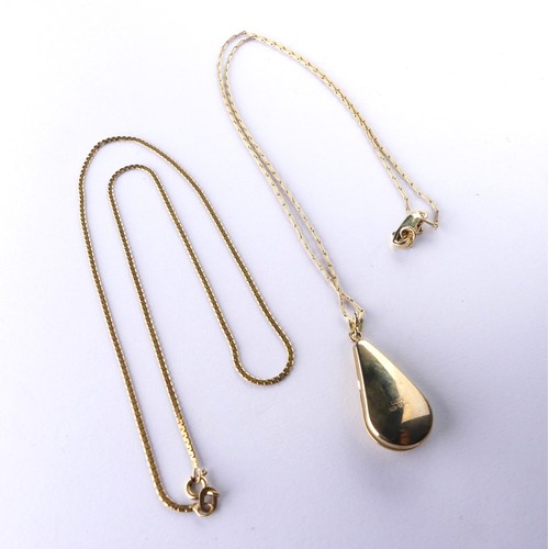 350 - A 9ct gold pear shaped Locket, 3.5cm long including suspension loop, on a 9ct gold trace chain, toge... 