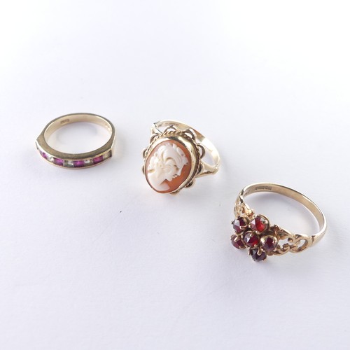 280 - A 9ct gold shell cameo Ring, Size O, together with a garnet cluster ring, Size P and a red and white... 