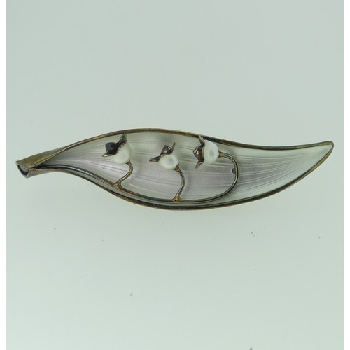 416 - A Norwegian silver gilt and enamel Lilly Brooch, by Arne Nordlie, 8.3cm long.