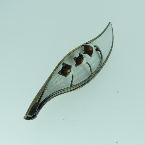 416 - A Norwegian silver gilt and enamel Lilly Brooch, by Arne Nordlie, 8.3cm long.