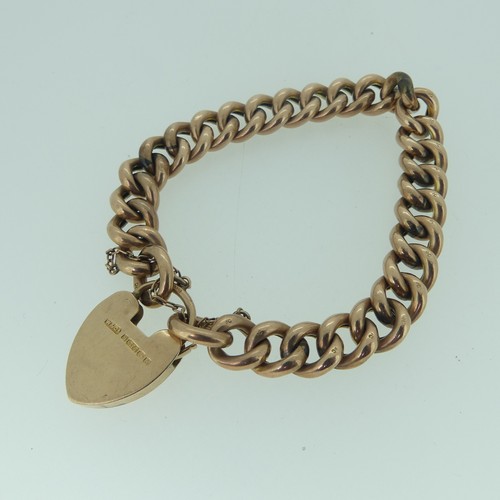 395 - A 9ct rose gold curb link Bracelet, with 9ct rose gold padlock clasp, approx total weight 20g.... 