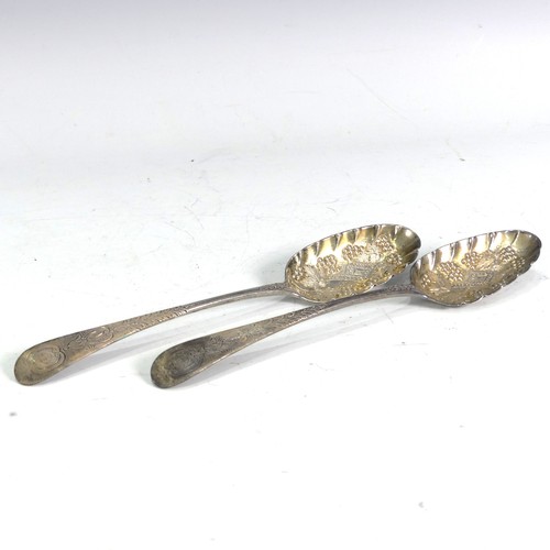 38 - A pair of George III silver Serving Spoons, makers mark 'W.T', hallmarked London, 1774, with later b... 