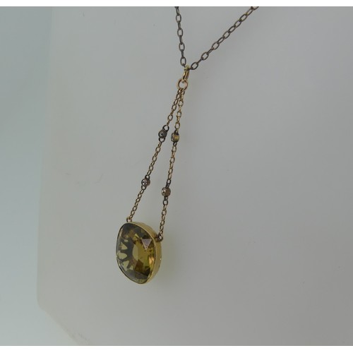 360 - An early 20thC citrine Pendant, the cushion cut stone approx 17x15mm, mounted in unmarked gold, test... 