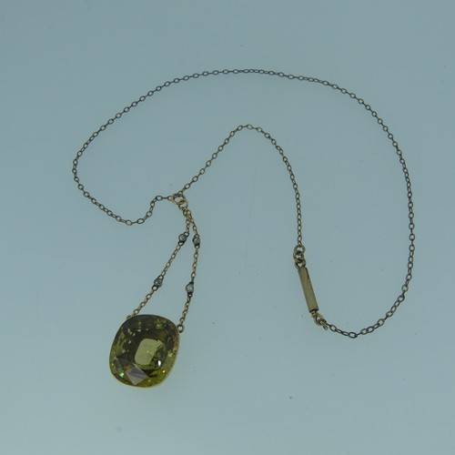 360 - An early 20thC citrine Pendant, the cushion cut stone approx 17x15mm, mounted in unmarked gold, test... 