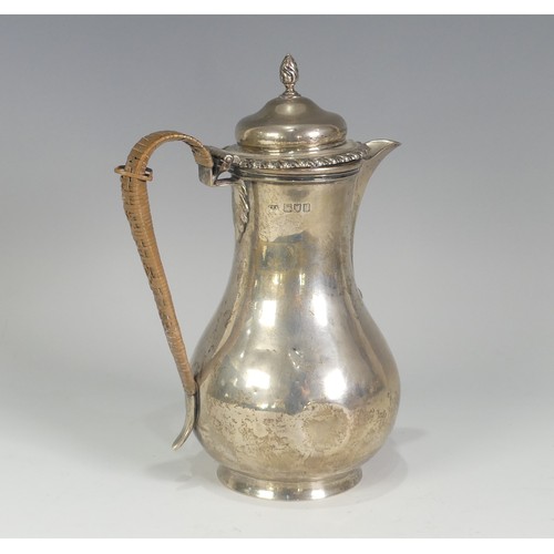 61 - A George V silver Hot Water Pot, by John Henry Rawlings, hallmarked London, 1912, of plain baluster ... 