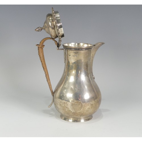 61 - A George V silver Hot Water Pot, by John Henry Rawlings, hallmarked London, 1912, of plain baluster ... 