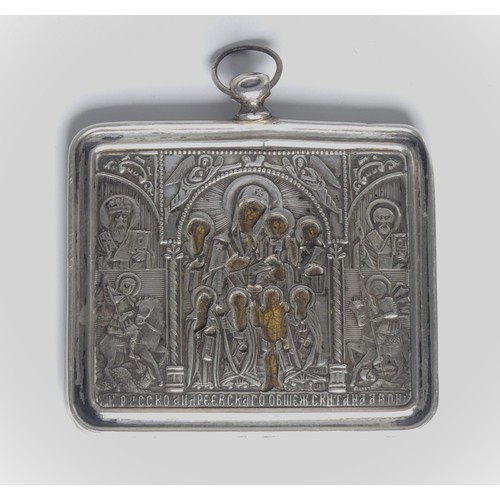 73 - A Russian silver mounted Icon, with velvet reverse, 6.5cm wide.