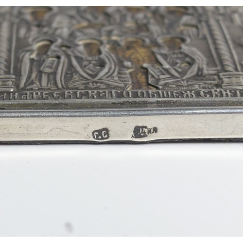 73 - A Russian silver mounted Icon, with velvet reverse, 6.5cm wide.