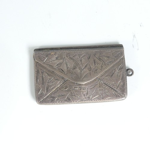 80 - An Edwardian silver double Stamp Case, Chester 1905, of envelope form with foliate decoration, toget... 