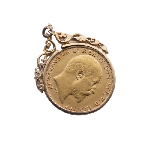 725 - An Edwardian gold Half Sovereign, dated 1909, in 9ct gold pendant mount, total weight 5.2g.... 