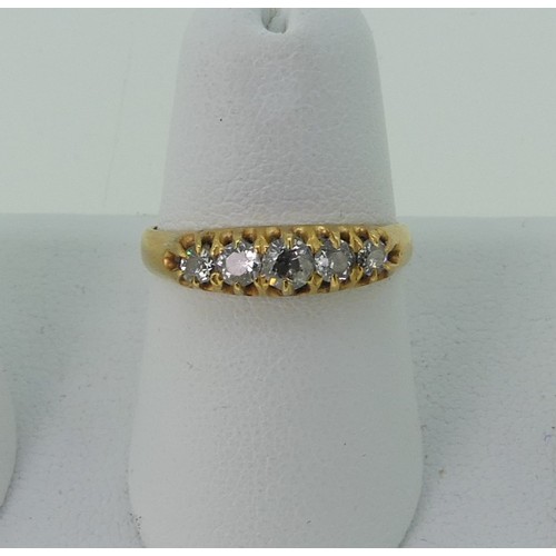 295 - A graduated five stone diamond Ring, the centre stone approx. 0.14ct, all mounted in unmarked yellow... 