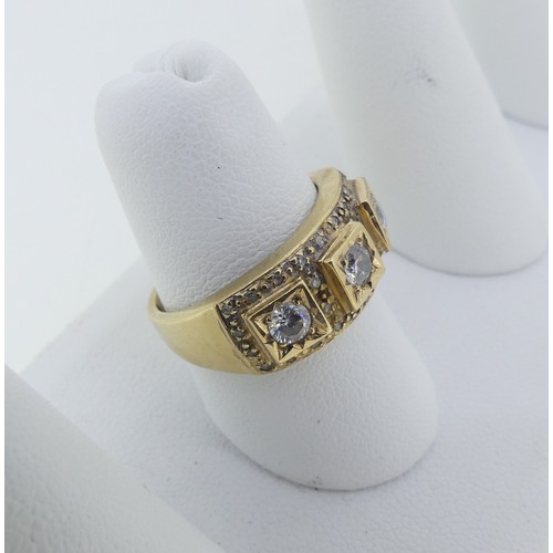 298 - A three stone white paste Ring, in squared 9ct gold mount, set small diamond points, Size N, 4.7g.... 