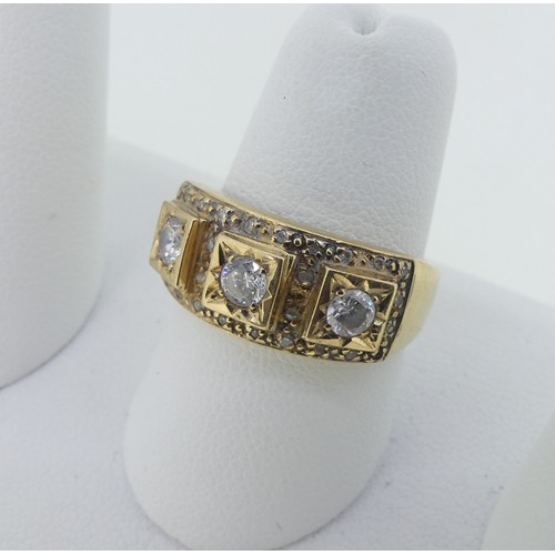 298 - A three stone white paste Ring, in squared 9ct gold mount, set small diamond points, Size N, 4.7g.... 