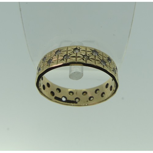 300 - A 9ct yellow gold Band, gypsy set two rows of white stones, one missing, Size T, 4g.... 