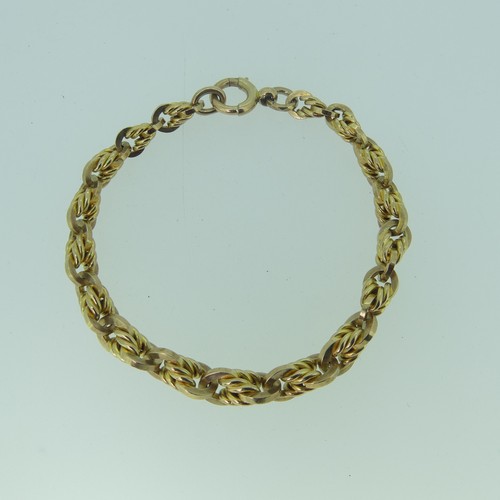 400 - A 9ct yellow gold Bracelet, with bolt ring clasp, 18ct long, 18.7g.