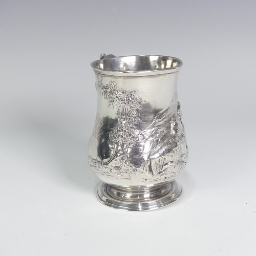 84 - A Victorian silver Half Pint Mug, hallmarked London, 1874, decorated in relief with agricultural she... 