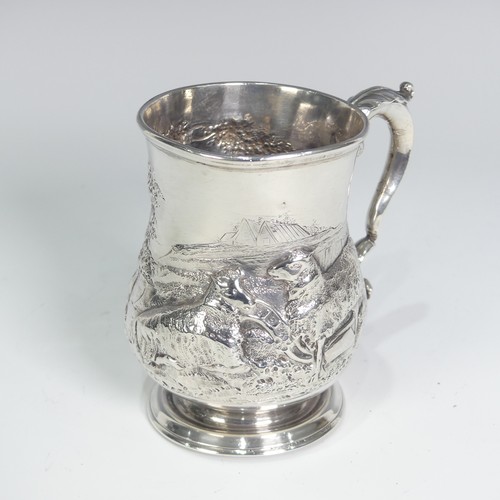 84 - A Victorian silver Half Pint Mug, hallmarked London, 1874, decorated in relief with agricultural she... 