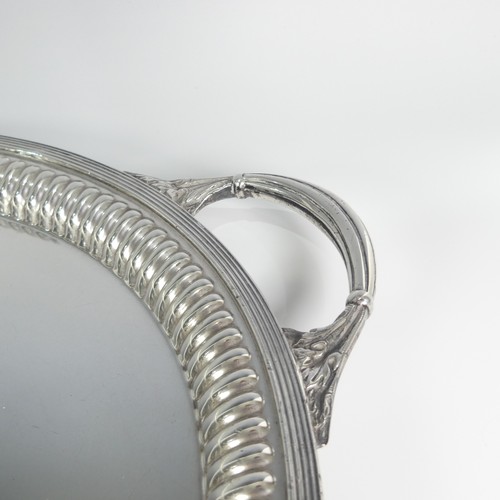 90 - A late Victorian silver oval two handled Tray, by Goldsmiths & Silversmiths Co., hallmarked Lond... 